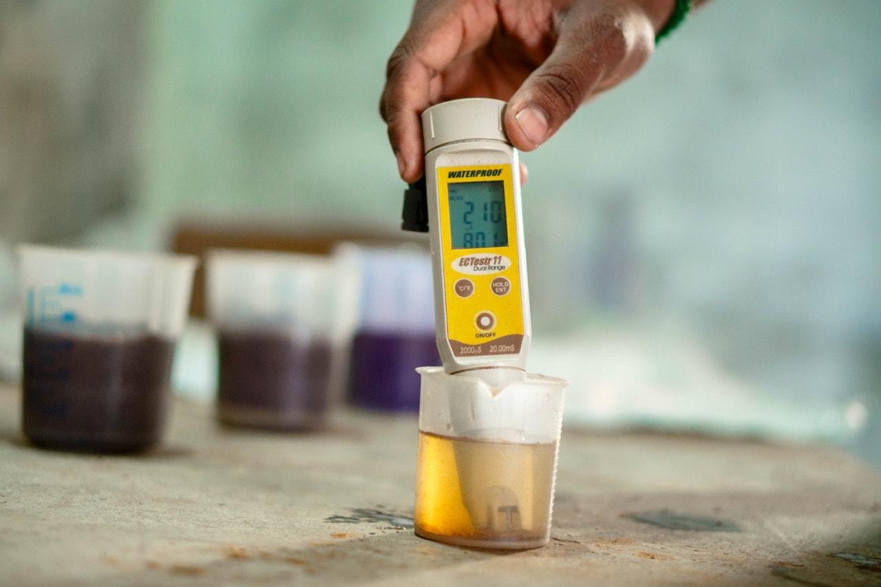 Technician testing a coir product sample